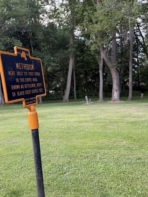 Methodism Marker with cemetery in church lot in the background image. Click for full size.