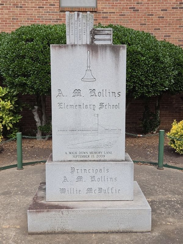 A.M. Rollins Elementary School monument, a short distance south of the park image. Click for full size.