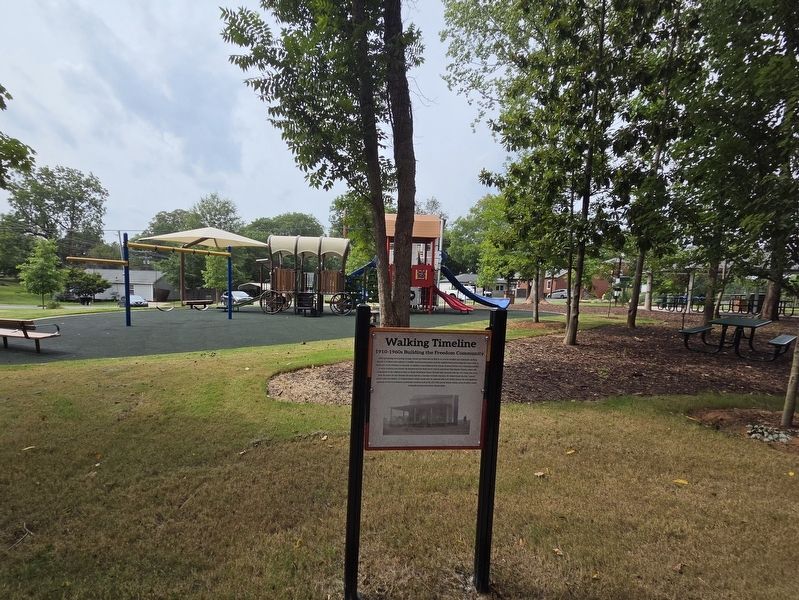 1910-1960s Building the Freedom Community Marker and playground image. Click for full size.