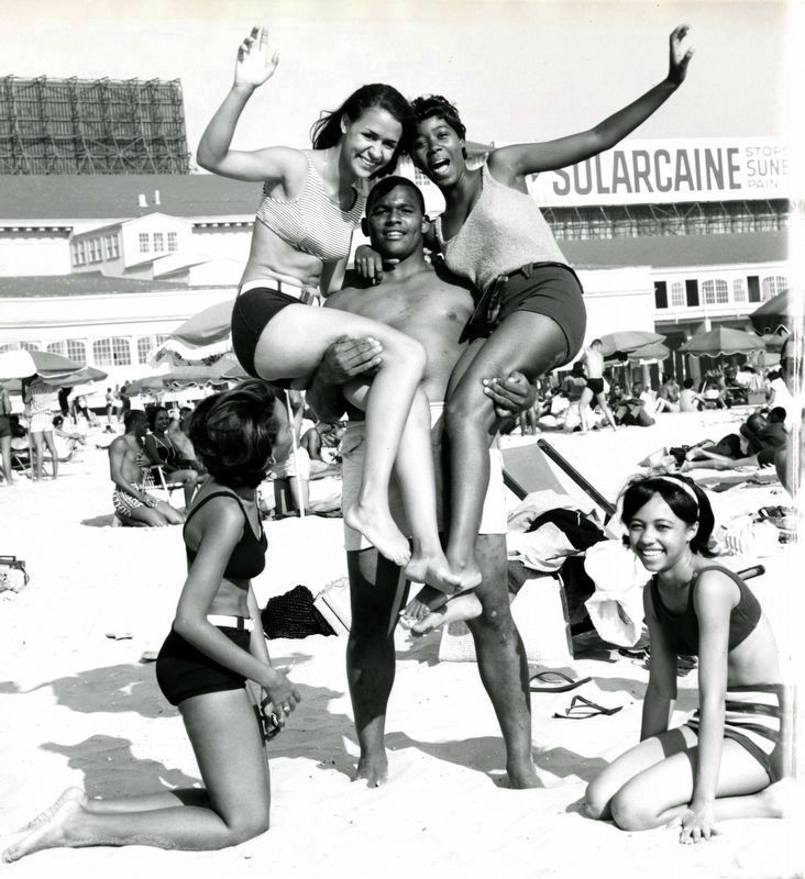 Butch Williams posed holding Gloria Phillis and Cheryl Steele in his arms on Chicken Bone Beach image. Click for full size.