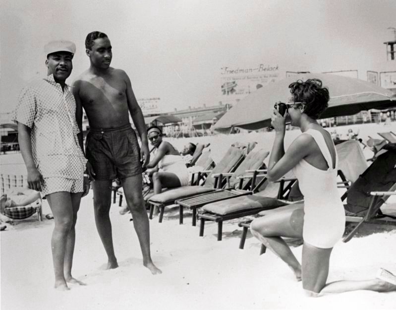 Civil rights leader Martin Luther King, Jr. (left) posed for a snapshot image. Click for full size.