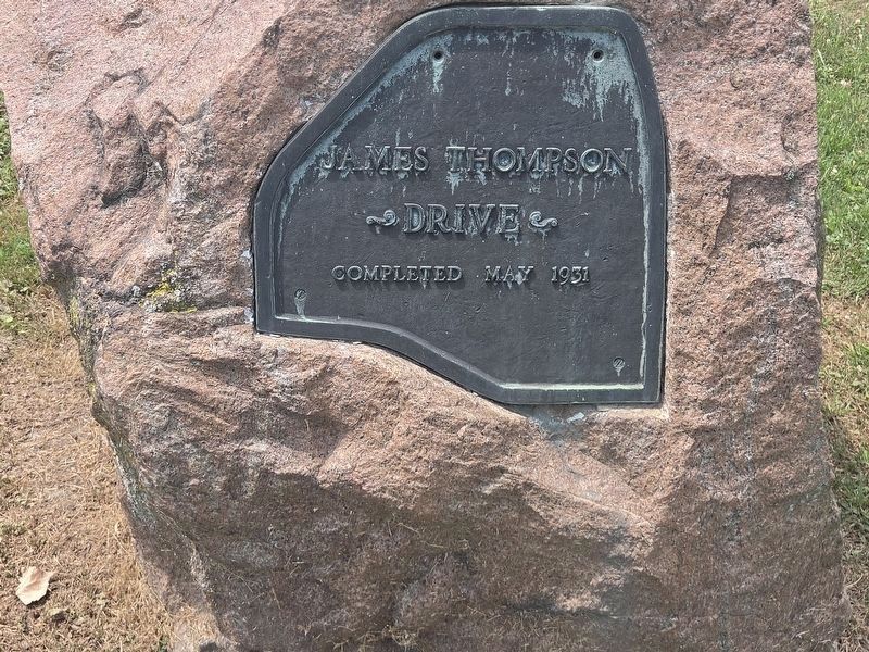 James Thompson Drive completed May 1931, across the road from the marker. Click for full size. James Thompson Drive completed May 1931, across the road from the marker image. Click for full size.
