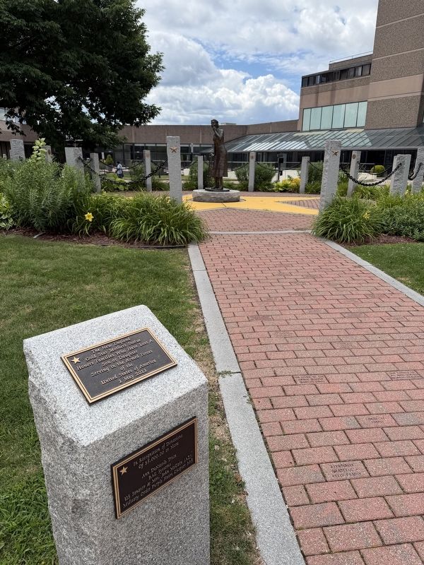 The New England Gold Star Mothers Statue with Marker in Foreground. Click for full size. The New England Gold Star Mothers Statue with Marker in Foreground image. Click for full size.
