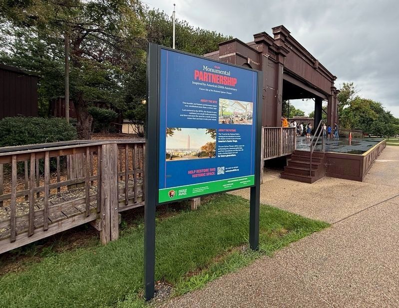 Future Site of the Restored Sylvan Theater Marker with the Sylvan Theater in the background. Click for full size. Future Site of the Restored Sylvan Theater Marker with the Sylvan Theater in the background image. Click for full size.