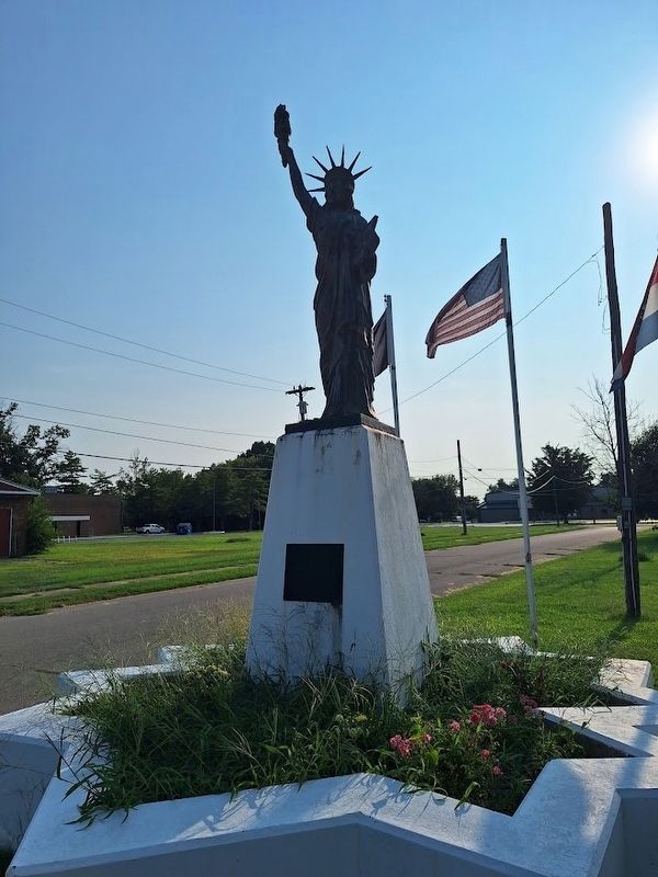 Replica of the Statue of Liberty Marker. Click for full size. Replica of the Statue of Liberty Marker image. Click for full size.
