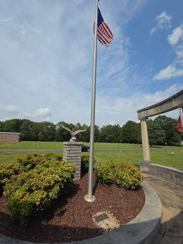 Veterans Memorial at ground level next to the flagpole. Click for full size. Veterans Memorial at ground level next to the flagpole image. Click for full size.