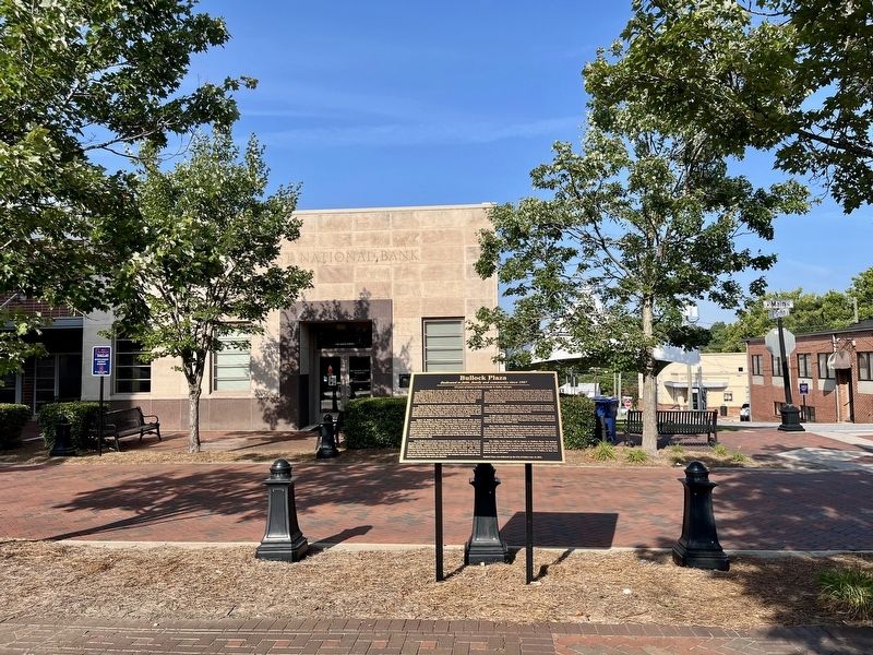 looking east with marker in front of First National Bank building. Click for full size. looking east with marker in front of First National Bank building image. Click for full size.