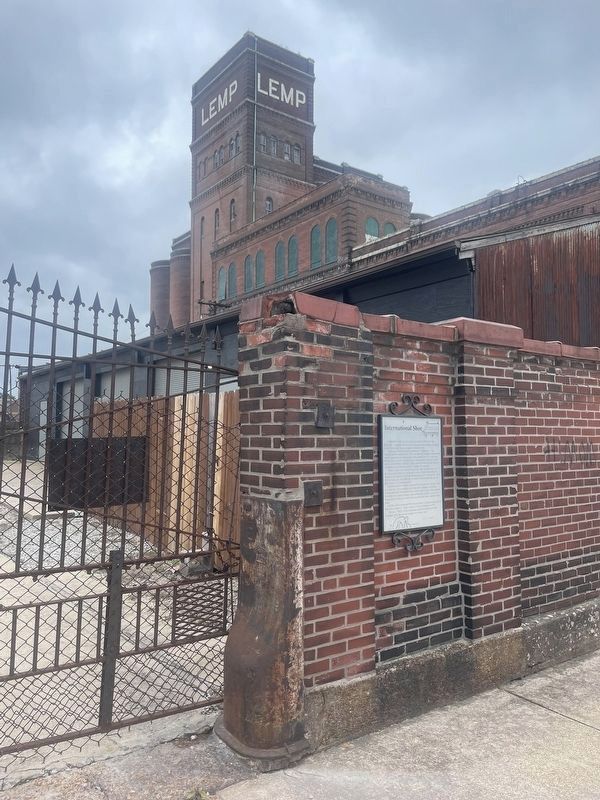 International Shoe Marker - cool context photo with "LEMP" in white bricks of tower in background. Click for full size. International Shoe Marker - cool context photo with "LEMP" in white bricks of tower in background image. Click for full size.