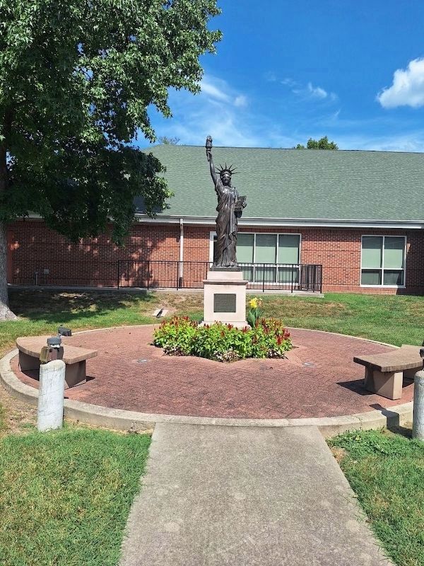Replica of the Statue of Liberty Marker. Click for full size. Replica of the Statue of Liberty Marker image. Click for full size.