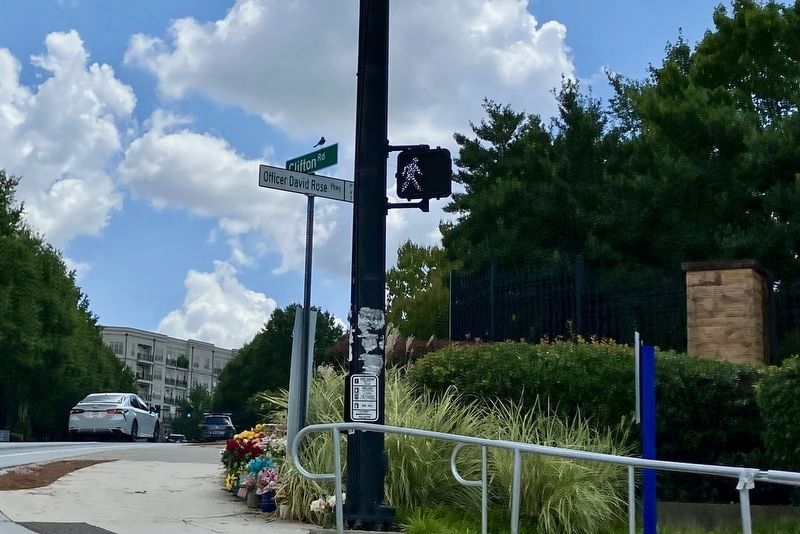 view east from marker showing newly renamed street sign "Officer David Rose Parkway". Click for full size. view east from marker showing newly renamed street sign "Officer David Rose Parkway" image. Click for full size.