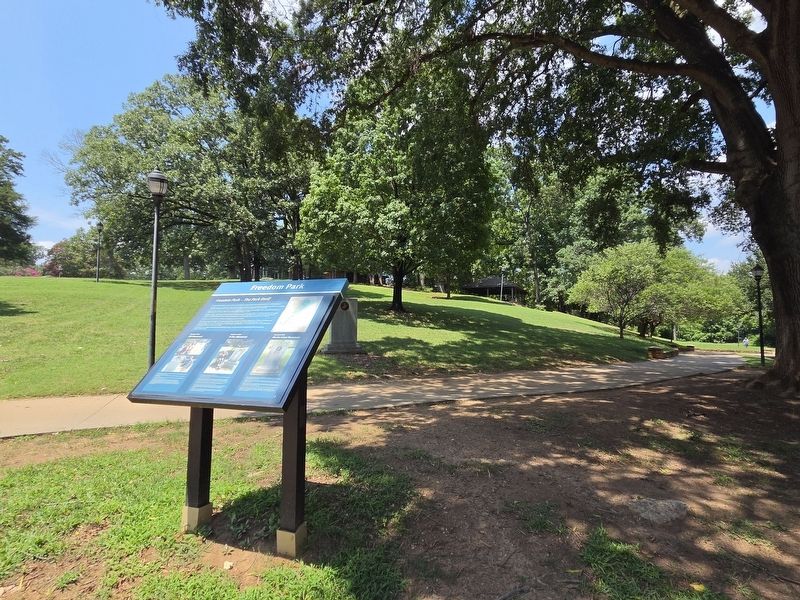 Freedom Park Marker look uphill to Mahlon Adams Pavilion. Click for full size. Freedom Park Marker look uphill to Mahlon Adams Pavilion image. Click for full size.