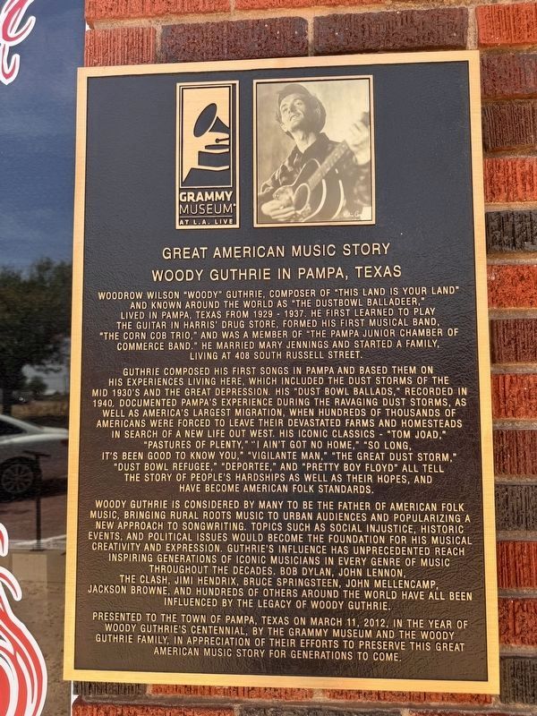 Woody Guthrie Plaque. Click for full size. Woody Guthrie Plaque image. Click for full size.