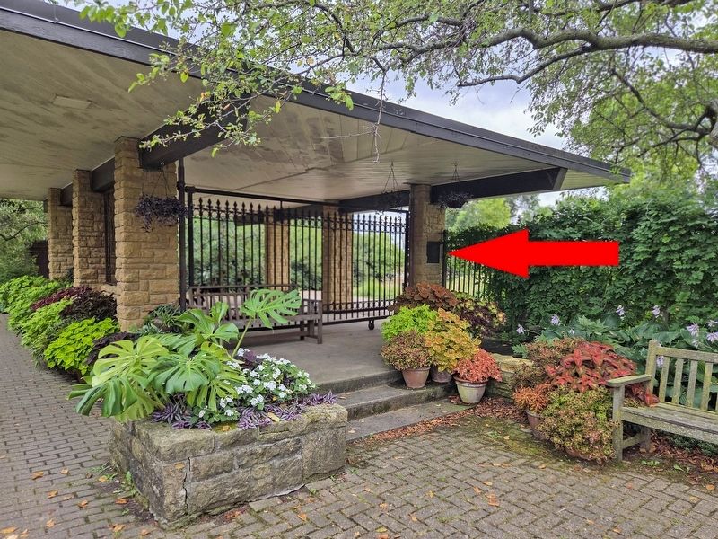 Arrow pointing to the John M. Olin Marker on the east shelter in the Sunken Garden. Click for full size. Arrow pointing to the John M. Olin Marker on the east shelter in the Sunken Garden image. Click for full size.