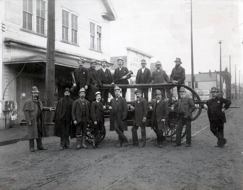 Fire fighters with engine in front of Columbia Hall.. Click for full size. Fire fighters with engine in front of Columbia Hall. image. Click for full size.