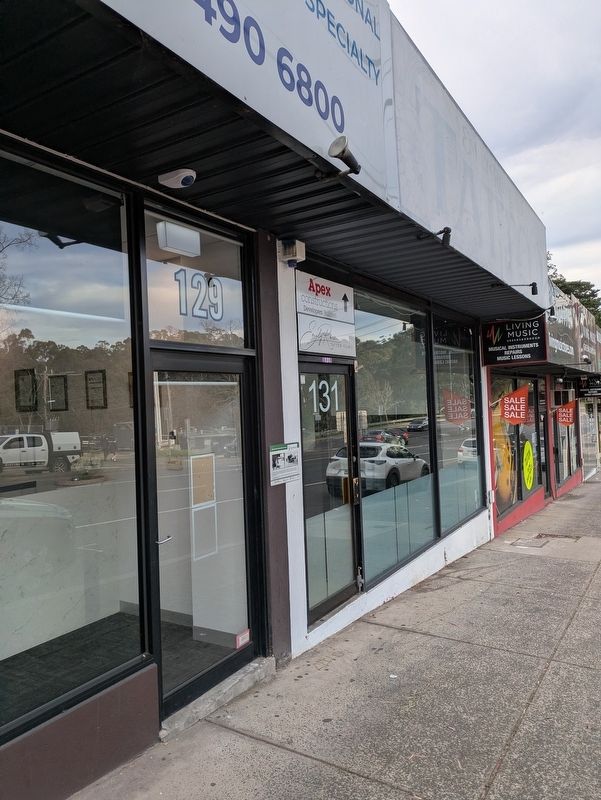 Quirk's the Tailor Marker on the shop front image. Click for full size.