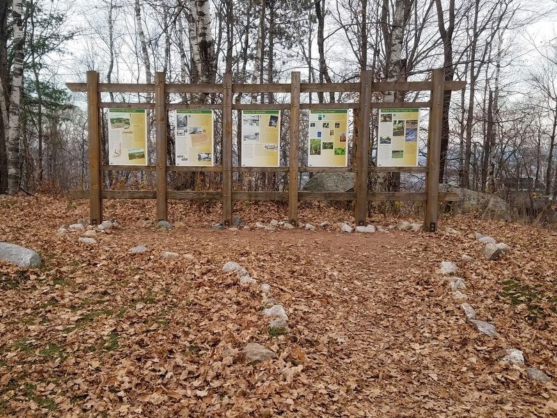 Skiing Rib Mountain Marker (center panel) in Rib Mountain State Park. Click for full size. Skiing Rib Mountain Marker (center panel) in Rib Mountain State Park image. Click for full size.