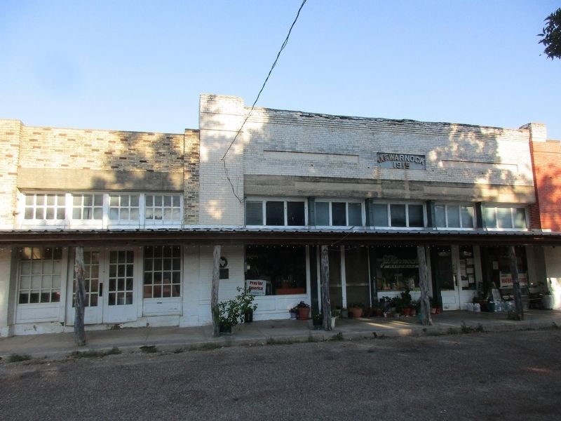 J. F. Warnock Hardware building and marker. Click for full size. J. F. Warnock Hardware building and marker image. Click for full size.