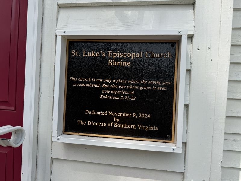Dedication plaque on the church. Click for full size. Dedication plaque on the church image. Click for full size.