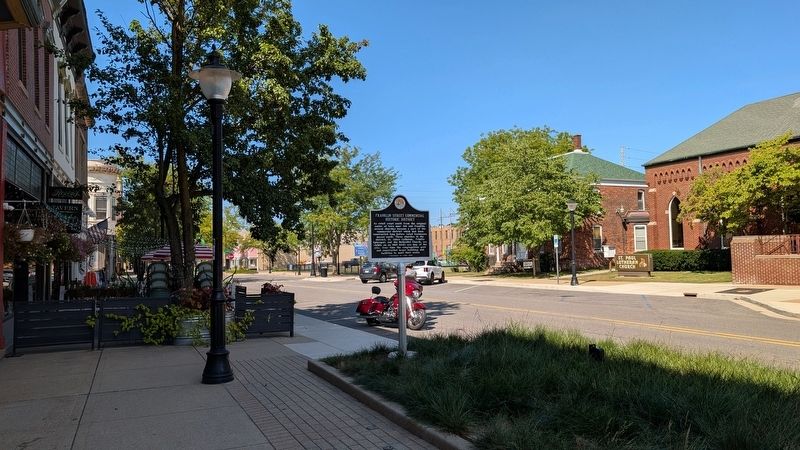 Franklin Street Commercial Historic District Marker in context, facing north image. Click for full size.