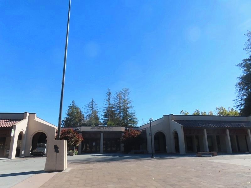 De Anza College Administration Building behind the marker on the flagpole plinth. Click for full size. De Anza College Administration Building behind the marker on the flagpole plinth image. Click for full size.