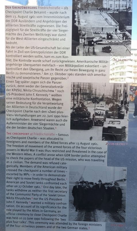 Checkpoint Charlie Marker - German and English text. Click for full size. Checkpoint Charlie Marker - German and English text image. Click for full size.