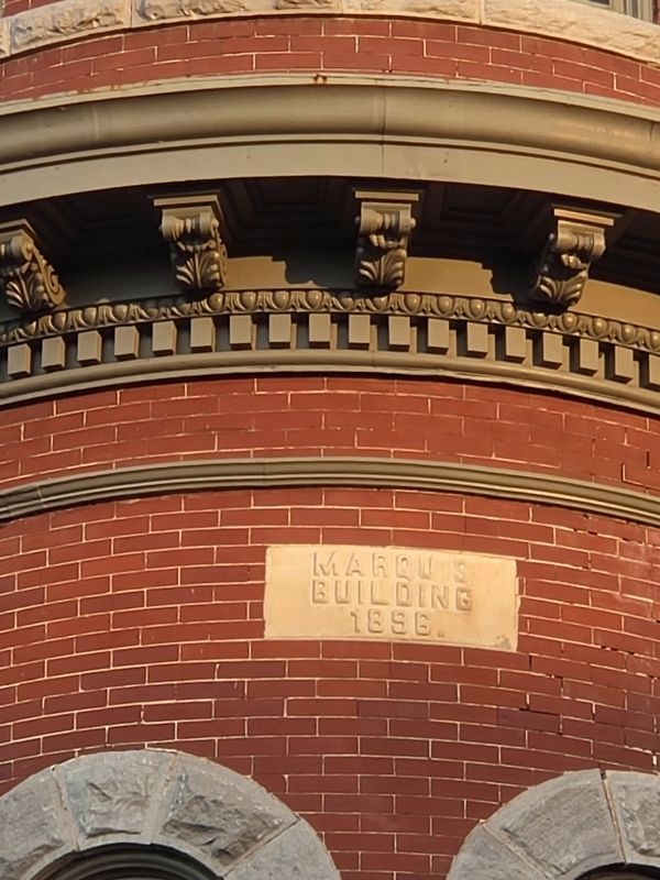 "Marquis" marker at the top of the turret at the Marquis Building. Click for full size. "Marquis" marker at the top of the turret at the Marquis Building image. Click for full size.