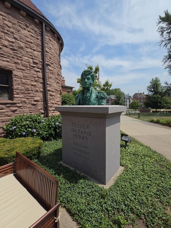 Full view Commodore Oliver Hazard Perry sculpture. Hagen History Center on the left. Click for full size. Full view Commodore Oliver Hazard Perry sculpture. Hagen History Center on the left image. Click for full size.