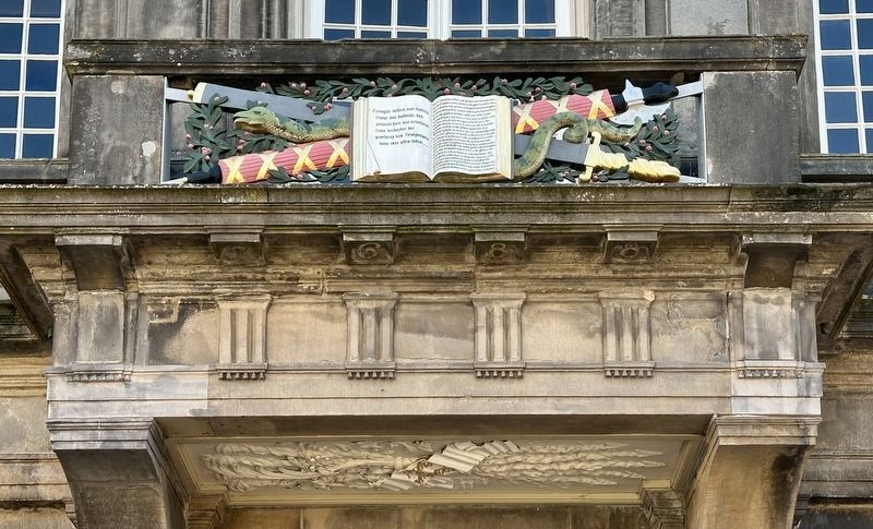 Relief above entrance with law book granting town rights (mentioned on marker). Click for full size. Relief above entrance with law book granting town rights (mentioned on marker) image. Click for full size.