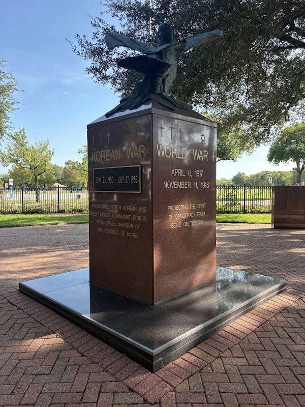 Sculpture base: Korean War and World War I. Click for full size. Sculpture base: Korean War and World War I image. Click for full size.