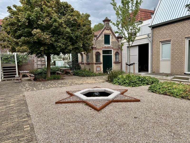 Courtyard with Metaheerhuis (Tahara (Ritual Washing) House), 2026. Click for full size. Courtyard with Metaheerhuis (Tahara (Ritual Washing) House), 2026 image. Click for full size.