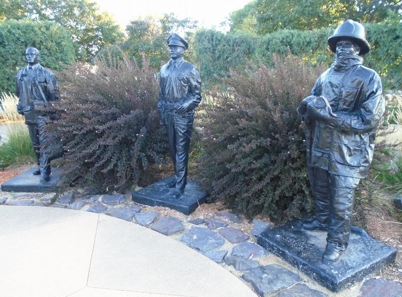 9/11 Memorial Park First Responders Statues. Click for full size. 9/11 Memorial Park First Responders Statues image. Click for full size.
