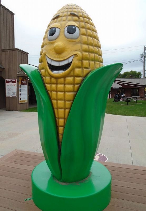 Comical Corn Cob Across Main Street From The Corn Palace. Click for full size. Comical Corn Cob Across Main Street From The Corn Palace image. Click for full size.