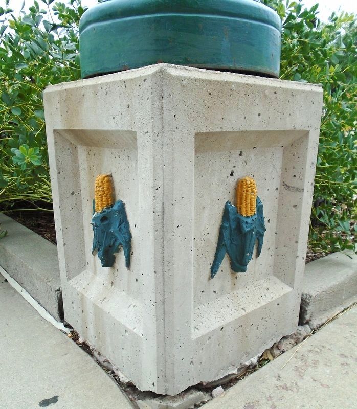 Corn Cob Accents on Street Pole Base. Click for full size. Corn Cob Accents on Street Pole Base image. Click for full size.
