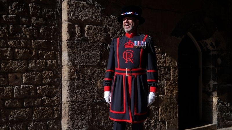 A Yeoman Warder in his newly produced dress showing Charles III's Cypher. image. Click for full size.