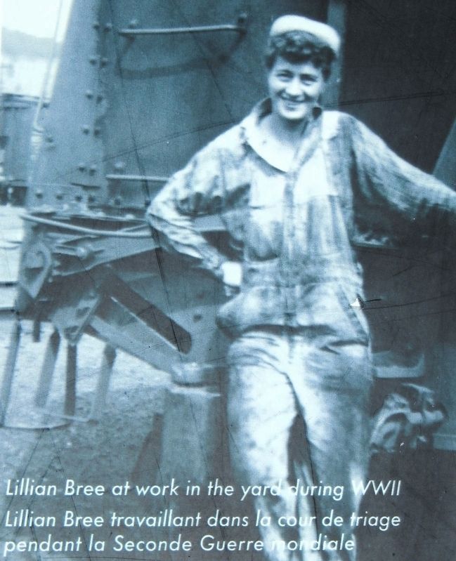 Marker detail: Lillian Bree at work in the yard during WWII.. Click for full size. Marker detail: Lillian Bree at work in the yard during WWII. image. Click for full size.