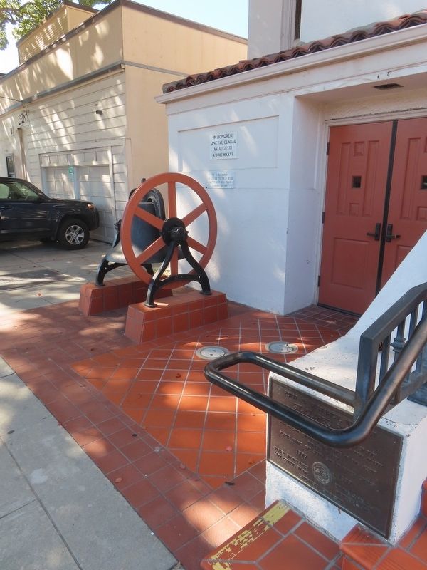 Marker on church’s entrance stairway by a bell. Click for full size. Marker on church’s entrance stairway by a bell image. Click for full size.