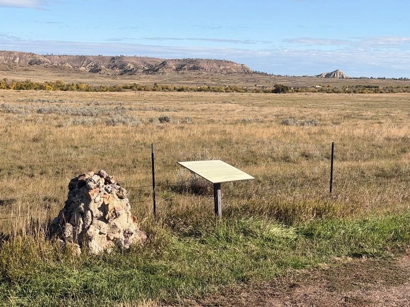 The original stone "Custer Camped Here Marker" has been vandalized with its plaque removed.. Click for full size. The original stone "Custer Camped Here Marker" has been vandalized with its plaque removed. image. Click for full size.