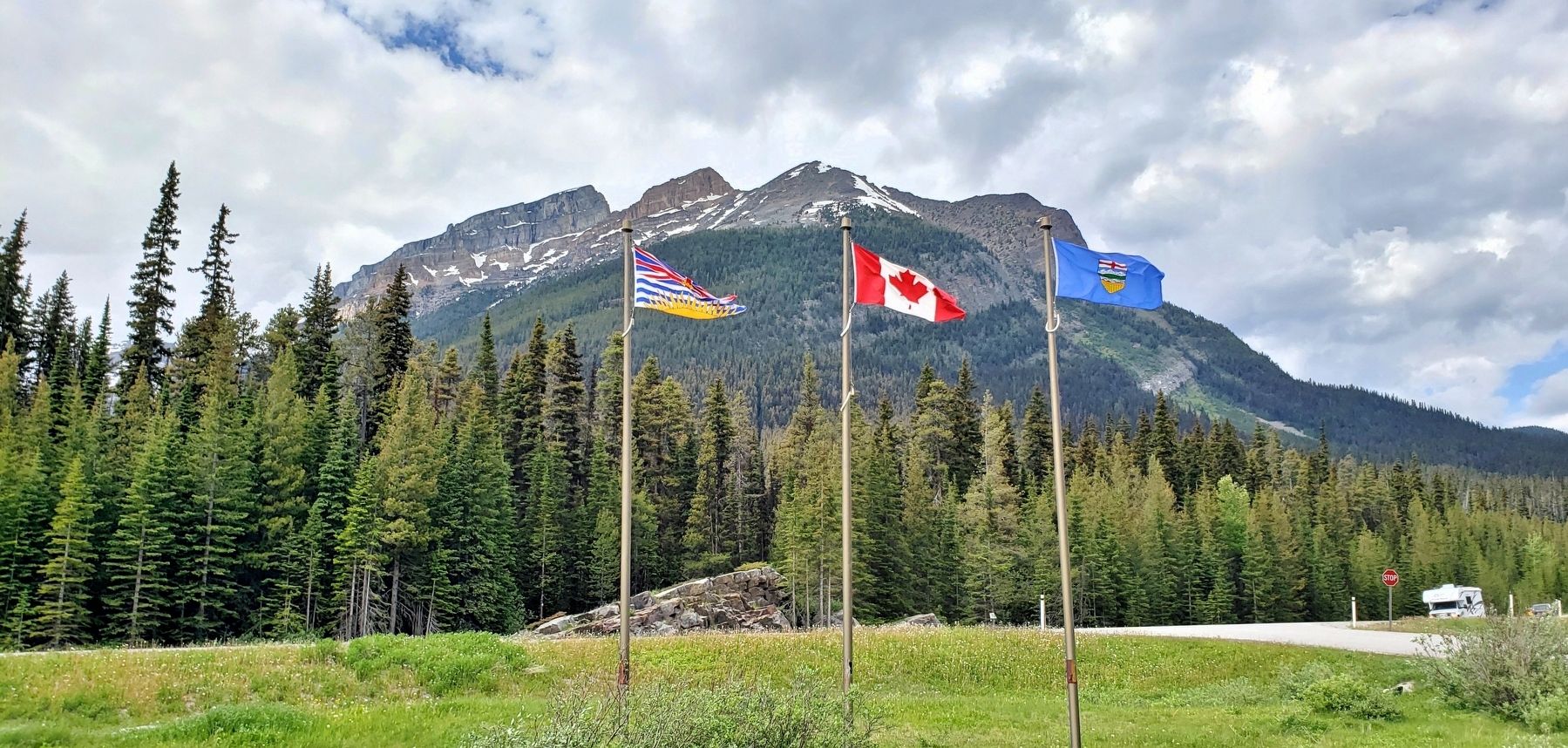 British Columbia, Canada and Alberta flags at Vermilion Pass. Click for full size. British Columbia, Canada and Alberta flags at Vermilion Pass image. Click for full size.